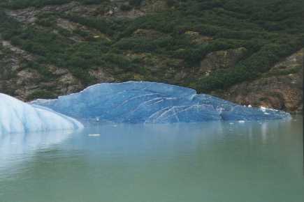A blue iceberg the size of a school bus