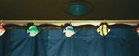 Fish shower curtain rod hooks